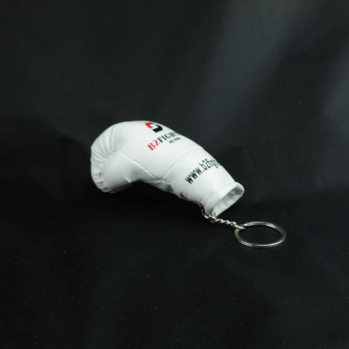 Mini-Boxhandschuh-Schlüsselanhänger, weißer Handschuh mit Kordel-Ring, Seitenansicht